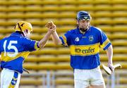 20 February 2005; Michael Webster, left, Tipperary, is congratulated by team-mate Evan Sweeney after scoring his sides second goal. Allianz National Hurling League, Division 1B, Tipperary v Down, Semple Stadium, Co.Tipperary. Picture credit; David Maher / SPORTSFILE