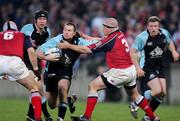 20 February 2005; Scott Barrow, Glasgow Rugby, in action against Gordon McIlwham (right) and Alan Quinlan (left), Munster. Celtic League 2004-2005, Pool 1, Munster v Glasgow Rugby, Thomond Park, Limerick. Picture credit; Kieran Clancy / SPORTSFILE