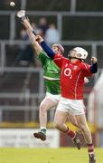 20 February 2005; Timmy McCarthy, Cork, in action against Brian Geary, Limerick. Allianz National Hurling League, Division 1B, Cork v Limerick, Pairc Ui Chaoimh, Cork. Picture credit; Brendan Moran / SPORTSFILE
