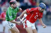 20 February 2005; Tom Kenny, Cork, in action against Damien Reale, Limerick. Allianz National Hurling League, Division 1B, Cork v Limerick, Pairc Ui Chaoimh, Cork. Picture credit; Brendan Moran / SPORTSFILE
