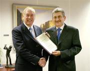 21 February 2005; AIB, one of the partners in Ireland's successful bid to bring the Ryder Cup to Ireland in 2006, has strengthened its Ryder Cup links by signing Christy O'Connor Jnr to be their Ryder Cup ambassador up to and including the event in September 2006. At the signing of a contract in relation to his role as AIB Ambassador for Ryder Cup 2006 is Christy with Billy Andrews of AIB. AIB Bankcentre, Ballsbridge, Dublin. Picture credit; Brendan Moran / SPORTSFILE
