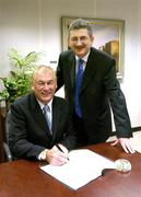 21 February 2005; AIB, one of the partners in Ireland's successful bid to bring the Ryder Cup to Ireland in 2006, has strengthened its Ryder Cup links by signing Christy O'Connor Jnr to be their Ryder Cup ambassador up to and including the event in September 2006. At the signing of a contract in relation to his role as AIB Ambassador for Ryder Cup 2006 with Christy is Billy Andrews of AIB. AIB Bankcentre, Ballsbridge, Dublin. Picture credit; Brendan Moran / SPORTSFILE