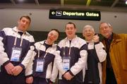 21 February 2005; Special Olympics Team Ireland, sponsored by eircom, athletes, from left, Ryan Hill, Rich Hill Co. Armagh, Cyril Walker, Glenanne, Co. Armagh, Liam Weir, Dungannon, Co. Tyrone and Finbar Hughes, Dungannon, Co. Tyrone, with Padraig Corkery, eircom Head of Sponsorship, before departing from Dublin Airport for the 2005 Special Olympics World Winter Games in Nagano, Japan. Dublin Airport, Dublin. Picture credit; Pat Murphy / SPORTSFILE