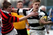 22 February 2005; Eoghan Browne, Belvedere College, is tackled by Martin Bryan, Kilkenny College. Leinster Schools Junior Cup Quarter-Final, Belvedere College v Kilkenny College, Donnybrook, Dublin. Picture credit; Pat Murphy / SPORTSFILE