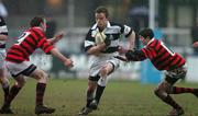 22 February 2005; Niall Myron, Belvedere College, is tackled by Jason Cassells, right, and Stephen Murray (2), Kilkenny College. Leinster Schools Junior Cup Quarter-Final, Belvedere College v Kilkenny College, Donnybrook, Dublin. Picture credit; Pat Murphy / SPORTSFILE