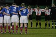 22 February 2005; Derry City and Linfield players stand for a minute silence before the start of the game. Pre-Season Friendly, Derry City v Linfield, Brandywell, Derry. Picture credit; David Maher / SPORTSFILE