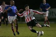 22 February 2005; Killian Brennan, Derry City, in action against Fitzroy Simpson, Linfield. Pre-Season Friendly, Derry City v Linfield, Brandywell, Derry. Picture credit; David Maher / SPORTSFILE
