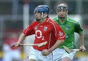 20 February 2005; Tom Kenny, Cork, in action against Donal O'Grady, Limerick. Allianz National Hurling League, Division 1B, Cork v Limerick, Pairc Ui Chaoimh, Cork. Picture credit; Brendan Moran / SPORTSFILE