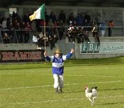 20 February 2005; Laois fan Joe Phelan with his cockerel on the pitch before the game. AIB All-Ireland Club Senior Football Championship Semi-Final, Crossmaglen Rangers v Portlaoise, Parnell Park, Dublin. Picture credit; Damien Eagers / SPORTSFILE