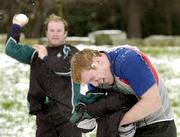 23 February 2005; Paul O'Connell is snowballed by team-mate Frank Sheahan after Ireland rugby squad training. Terenure Rugby Club, Dublin. Picture credit; Matt Browne / SPORTSFILE