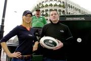 24 February 2005; Rugby pundit George Hook who was the first candidate to be dunked at the Guinness Draught Can Dunker in aid of the IRFU Charitable Trust for seriously injured players. The Dunker Unit will make an appearance on match days for home internationals and fans can donate money while having a go. Pictured are winner David Sharkey, from Letterkenny, Co. Donegal, with model Sarah McGovern. Grafton Street, Dublin. Picture credit; Brendan Moran / SPORTSFILE