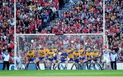 28 September 2013; Clare players prepare to defend an Anthony Nash free which resulted in a Cork goal during the GAA Hurling All-Ireland Senior Championship Final Replay match between Cork and Clare at Croke Park in Dublin. Photo by Stephen McCarthy/Sportsfile