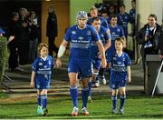 30 November 2013; Leinster captain Shane Jennings with matchday mascots Mark Molloy, age 8, from Leopardstown, Dublin, left, and JJ Ryan, age 7, from Stepaside, Dublin, ahead of the game. Celtic League 2013/14 Round 9, Leinster v Scarlets, RDS, Ballsbridge, Dublin. Picture credit: Stephen McCarthy / SPORTSFILE