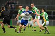 1 December 2013; Conor Nevin, Ballinderry Shamrocks, in action against Michael Murphy and Darren McGinley, Glenswilly. AIB Ulster Senior Club Football Championship Final, Glenswilly, Donegal v Ballinderry Shamrocks, Derry, Healy Park, Omagh, Co. Tyrone. Picture credit: Oliver McVeigh / SPORTSFILE