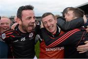 1 December 2013; James Hickey, Mount Leinster Rangers, celebrates with manager Tom Mullally, after the game. AIB Leinster Senior Club Hurling Championship Final, Oulart the Ballagh, Wexford v  Mount Leinster Rangers, Carlow, Nowlan Park, Kilkenny. Photo by Sportsfile