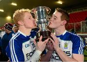 1 December 2013; Colin Devlin, left, and Aaron Devlin, Ballinderry Shamrocks, with the Seamus McFerran cup after the game. AIB Ulster Senior Club Football Championship Final, Glenswilly, Donegal v Ballinderry Shamrocks, Derry, Healy Park, Omagh, Co. Tyrone. Picture credit: Oliver McVeigh / SPORTSFILE