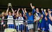 1 December 2013; Conor Nevin, left, Ballinderry Shamrocks, holds up the Seamus McFerran cup as the rest of the squad celebrate after the game. AIB Ulster Senior Club Football Championship Final, Glenswilly, Donegal v Ballinderry Shamrocks, Derry, Healy Park, Omagh, Co. Tyrone. Picture credit: Oliver McVeigh / SPORTSFILE