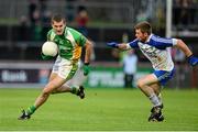 1 December 2013; Colin Kelly, Glenswilly, in action against Ryan Scott, Ballinderry Shamrocks. AIB Ulster Senior Club Football Championship Final, Glenswilly, Donegal v Ballinderry Shamrocks, Derry, Healy Park, Omagh, Co. Tyrone. Picture credit: Oliver McVeigh / SPORTSFILE