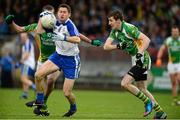 1 December 2013; Conleith Gilligan, Ballinderry Shamrocks, in action against Colin Kelly, left, and Ryan Toner, Glenswilly. AIB Ulster Senior Club Football Championship Final, Glenswilly, Donegal v Ballinderry Shamrocks, Derry, Healy Park, Omagh, Co. Tyrone. Picture credit: Oliver McVeigh / SPORTSFILE
