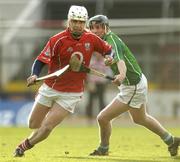 20 February 2005; Timmy McCarthy, Cork, in action against Donal O'Grady, Limerick. Allianz National Hurling League, Division 1B, Cork v Limerick, Pairc Ui Chaoimh, Cork. Picture credit; Brendan Moran / SPORTSFILE