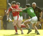20 February 2005; Pat Mulcahy, Cork, in action against Alan O'Connor and Donal O'Grady, right, Limerick. Allianz National Hurling League, Division 1B, Cork v Limerick, Pairc Ui Chaoimh, Cork. Picture credit; Brendan Moran / SPORTSFILE
