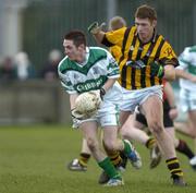 20 February 2005; Craig Rogers, Portlaoise, in action against Anthony Cunningham, Crossmaglen Rangers. AIB All-Ireland Club Senior Football Championship Semi-Final, Crossmaglen Rangers v Portlaoise, Parnell Park, Dublin. Picture credit; Damien Eagers / SPORTSFILE