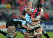 20 February 2005; Trevor Hogan, Munster, in action against Cameron Mather, Glasgow Rugby. Celtic League 2004-2005, Pool 1, Munster v Glasgow Rugby, Thomond Park, Limerick. Picture credit; Kieran Clancy / SPORTSFILE