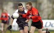 25 February 2005; Conor McCarthy, UCC, in action against Alan Costello, Sligo IT. Datapac Sigerson Cup Semi-Final, Sligo IT v University College Cork, Dundalk IT, Dundalk, Co. Louth. Picture credit; Matt Browne / SPORTSFILE