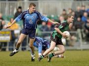 25 February 2005; John Turley, QUB, in action against Phillip Loughran, UUJ. Datapac Sigerson Cup Semi-Final, Queens University Belfast v University of Ulster Jordanstown, Dundalk IT, Dundalk, Co. Louth. Picture credit; Matt Browne / SPORTSFILE