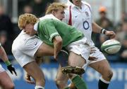25 February 2005; Olly Morgan, England U21, is tackled by  Andrew Trimble, Ireland U21. U21 Rugby Championship, Ireland U21 v England U21, Donnybrook, Dublin. Picture credit; David Maher / SPORTSFILE