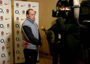 26 February 2005; Coach Andy Robinson prepares to be interviewed by television at an England Rugby press conference prior to their RBS Six Nations game against Ireland. Four Season's Hotel, Dublin. Picture credit; Brendan Moran / SPORTSFILE