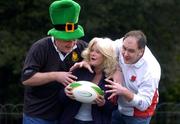 26 February 2005; England fans, from Deal, Kent, Lynn Marshall with husband Gareth Marshall, right, and Patrick Marriott get to grips with a rugby ball prior to the RBS Six Nations game against Ireland. St. Stephen's Green, Dublin. Picture credit; Brian Lawless / SPORTSFILE