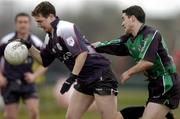 26 February 2005; Paddy O'Connor, Sligo IT, in action against Ryan O'Neill, QUB. Datapac Sigerson Cup Final, Sligo IT v Queens University Belfast, Dundalk IT, Dundalk, Co. Louth. Picture credit; Matt Browne / SPORTSFILE