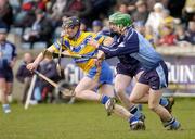 26 February 2005; Niall Gilligan, Clare, in action against Michael Carton, right, and Ronan Fallon, Dublin.  Allianz National Hurling League, Division 1A, Dublin v Clare, Parnell Park, Dublin. Picture credit; Brian Lawless / SPORTSFILE
