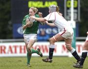 26 February 2005; Sarah Jane Belton, Ireland, in action against Rachel Vickers, England. Women's Six Nations Rugby Championship, Ireland v England, Templeville Road, Dublin. Picture credit; Ciara Lyster / SPORTSFILE