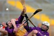 27 February 2005; Willie Doran, left, and Des Mythen, Wexford, in action against Pat Mulcahy, Cork. Allianz National Hurling League, Division 1B, Wexford v Cork, Wexford Park, Wexford. Picture credit; David Maher / SPORTSFILE
