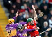 27 February 2005; Michael Jacob, no. 9, and Redmond Barry, Wexford, in action against Jerry O'Connor, Cork. Allianz National Hurling League, Division 1B, Wexford v Cork, Wexford Park, Wexford. Picture credit; David Maher / SPORTSFILE