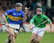 27 February 2005; Mark O'Leary, Tipperary, in action against Damien Reale, Limerick. Allianz National Hurling League, Division 1B, Limerick v Tipperary, Gaelic Grounds, Limerick. Picture credit; Kieran Clancy / SPORTSFILE