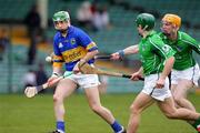 27 February 2005; Benny Dunne, Tipperary, in action against Donnacha Sheehan and Paudie O'Dwyer, Limerick. Allianz National Hurling League, Division 1B, Limerick v Tipperary, Gaelic Grounds, Limerick. Picture credit; Kieran Clancy / SPORTSFILE