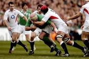 27 February 2005; John Hayes, Ireland, is tackled by Ben Kay, England. RBS Six Nations Championship 2005, Ireland v England, Lansdowne Road, Dublin. Picture credit; Matt Browne / SPORTSFILE