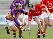 27 February 2005; Neil Ronan, Cork, in action against John O'Connor, Wexford. Allianz National Hurling League, Division 1B, Wexford v Cork, Wexford Park, Wexford. Picture credit; David Maher / SPORTSFILE