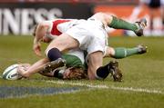 27 February 2005; Brian O'Driscoll, Ireland, is tackled by Josh Lewsey, England, on the try line. RBS Six Nations Championship 2005, Ireland v England, Lansdowne Road, Dublin. Picture credit; Matt Browne / SPORTSFILE