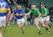 27 February 2005; Evan Sweeney, Tipperary, in action against Niall Moran and Ollie Moran, Limerick. Allianz National Hurling League, Division 1B, Limerick v Tipperary, Gaelic Grounds, Limerick. Picture credit; Kieran Clancy / SPORTSFILE
