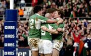 27 February 2005; Brian O'Driscoll, Ireland, is congratulated  by Peter Stringer, 9, Shane Horgan, 12, and Ronan O'Gara after his try against England. RBS Six Nations Championship 2005, Ireland v England, Lansdowne Road, Dublin. Picture credit; Matt Browne / SPORTSFILE