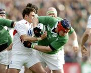 27 February 2005; Anthony Foley, Ireland, is tackled by Harry Ellis, England. RBS Six Nations Championship 2005, Ireland v England, Lansdowne Road, Dublin. Picture credit; Brendan Moran / SPORTSFILE
