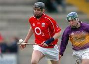 27 February 2005; Pat Mulcahy, Cork, in action against Paul Carley, Wexford. Allianz National Hurling League, Division 1B, Wexford v Cork, Wexford Park, Wexford. Picture credit; David Maher / SPORTSFILE