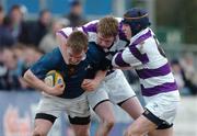 28 February 2005; Colin Franklin, St. Mary's College, is tackled by Nick Delehanty, left, and Robert Timlin, Clongowes Wood. Leinster Schools Junior Cup Quarter-Final, Clongowes Wood College v St. Mary's, Donny Brook, Dublin. Picture credit; Pat Murphy / SPORTSFILE