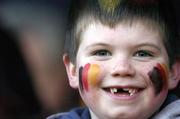 1 March 2005; C.B.C. Monkstown fan Conor Johnston, 8 years old, from Glenageary, watches on during the game. Leinster Schools Junior Cup Quarter-Final, Terenure College v CBC Monkstown, Donnybrook, Dublin. Picture credit; Brian Lawless / SPORTSFILE