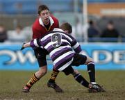 1 March 2005; Killian Horgan, CBC Monkstown, is tackled by Graham Flanagan, Terenure College. Leinster Schools Junior Cup Quarter-Final, Terenure College v CBC Monkstown, Donnybrook, Dublin. Picture credit; Brian Lawless / SPORTSFILE