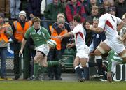27 February 2005; Brian O'Driscoll, Ireland, takes the ball into his hands on his way to evading the tackle of Charlie Hodgson (10), England, and scoring his sides only try of the game. RBS Six Nations Championship 2005, Ireland v England, Lansdowne Road, Dublin. Picture credit; Brendan Moran / SPORTSFILE